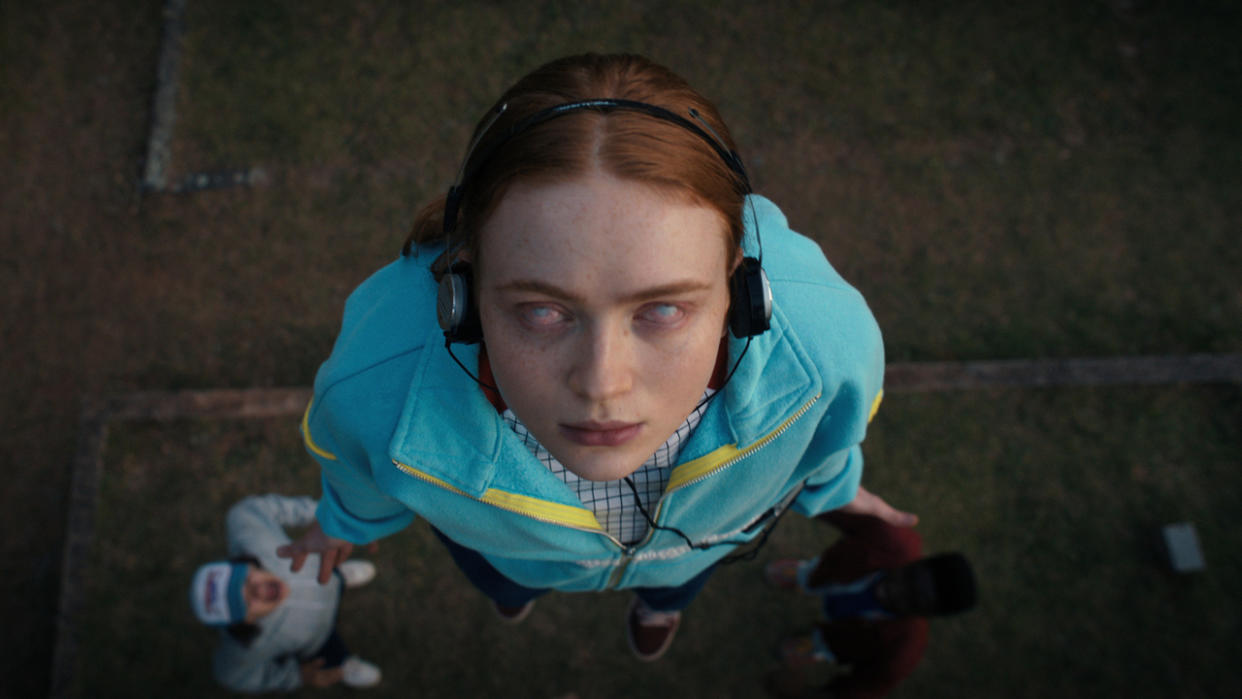  Sadie Sink as May Mayfield listening to "Running up that Hill" in Stranger Things Season 4. 