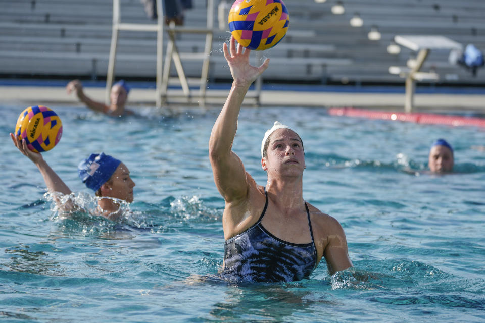 U.S. women's water polo player Rachel Fattal, a two-time gold medal Olympian, practices at MWR Aquatic Training Center in Los Alamitos, Calif., Thursday, Jan. 18, 2024. The versatile Fattal is a key player for the U.S. as it goes for a fourth consecutive gold medal at the Paris Olympics this summer. (AP Photo/Damian Dovarganes)