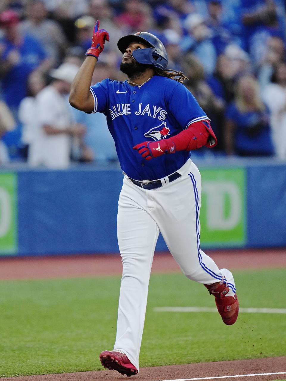 Toronto Blue Jays' Vladimir Guerrero Jr. celebrates his solo home run against the Tampa Bay Rays during the first inning of a baseball game Wednesday, Sept. 14, 2022, in Toronto. (Frank Gunn/The Canadian Press via AP)