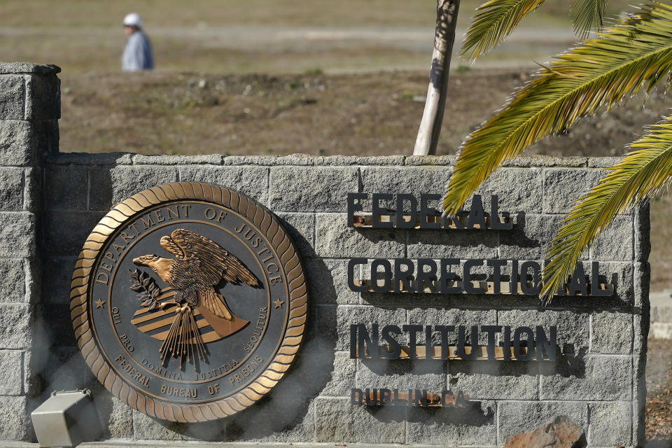 The Federal Correctional Institution is shown in Dublin, Calif., Monday, Dec. 5, 2022. Thomas Ray Hinkle, a senior official at the federal Bureau of Prisons has been repeatedly promoted, most recently to one of the highest posts in the agency. And this has happened despite his being accused of beating multiple Black inmates in the 1990s. An Associated Press investigation has found the Bureau of Prisons has continued to promote Hinkle despite numerous red flags. (AP Photo/Jeff Chiu)