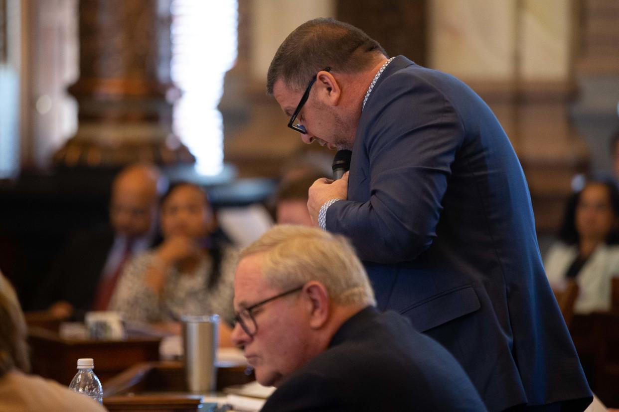 Sen. Rick Kloos, R-Topeka, changes his vote during Wednesday's Senate session at the Statehouse.