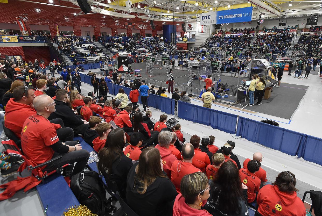 Bedford Express FRC Team #1023 supporters, team members watch as their robot competes on the DTE Energy Foundation field at the FIRST Robotics Competition.