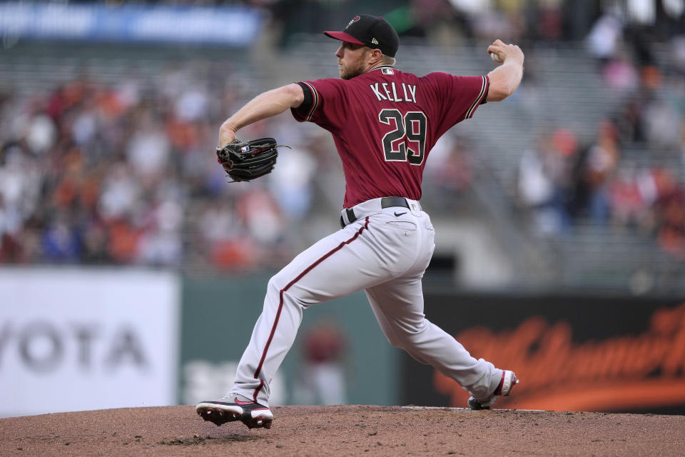 Arizona Diamondbacks starting pitcher Merrill Kelly throws to a San Francisco Giants batter during the first inning of a baseball game Wednesday, June 16, 2021, in San Francisco. (AP Photo/Tony Avelar)