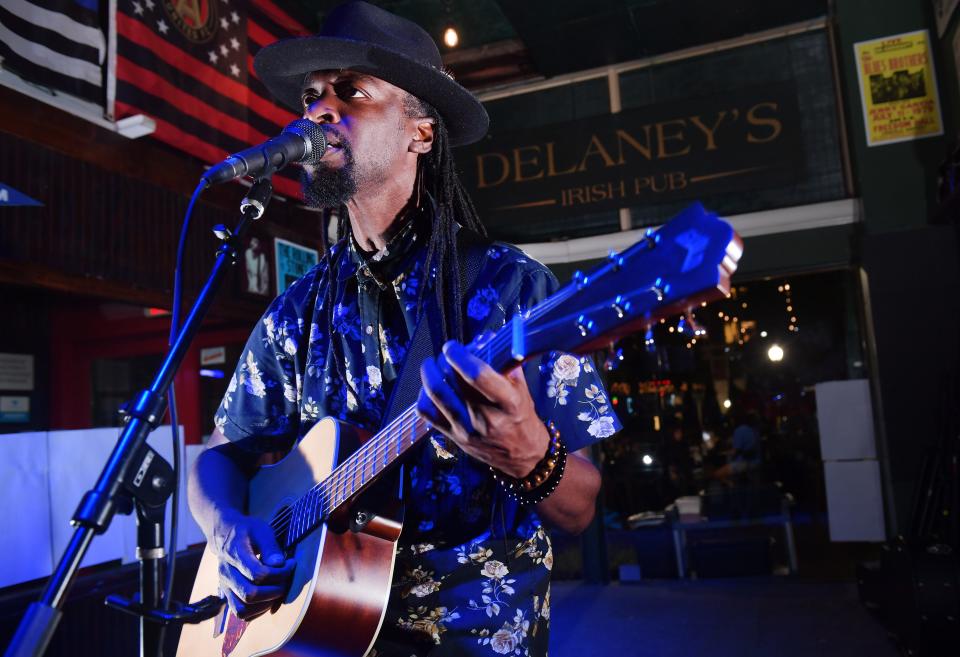 TJ Jeter has started playing for weddings and other events in addition to playing live performances. Competition for live gigs are getting scarce as small venues close because of rising insurance costs. In this photo, Jeter plays at Delaney's Pub in downtown Spartanburg on Sept. 14, 2023.