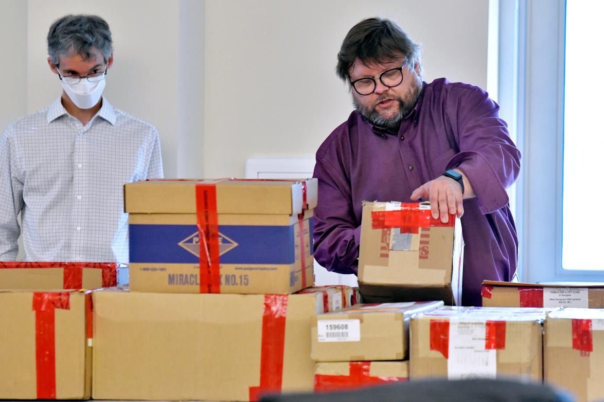 <p>File image: Election auditors Harri Hursti, right, and Mark Lindeman, catalog ballot boxes in Pembroke, New Hampshire, during a forensic audit of the 2020 New Hampshire legislative election. Auditors have found no evidence of fraud or political bias in the controversial New Hampshire election that has drawn the interest of Donald Trump</p> (AP)