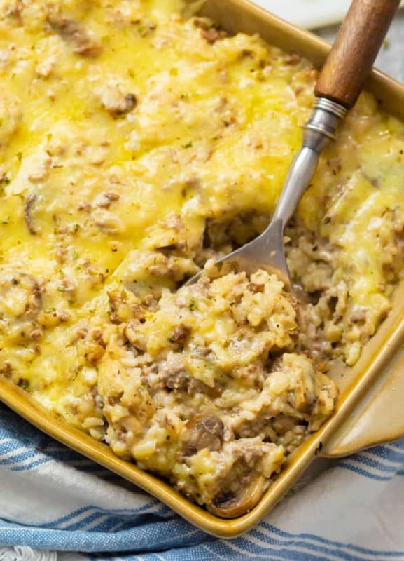 This cheesy ground beef and rice casserole is easy to make with pantry ingredients like cream of mushroom soup. Your family will love this quick dinner recipe!<p><strong>Get the recipe: <a href="https://thecozycook.com/ground-beef-and-rice-casserole/" rel="sponsored" target="_blank" data-ylk="slk:Cheesy Ground Beef and Rice Casserole;elm:context_link;itc:0;sec:content-canvas" class="link ">Cheesy Ground Beef and Rice Casserole</a></strong></p>
