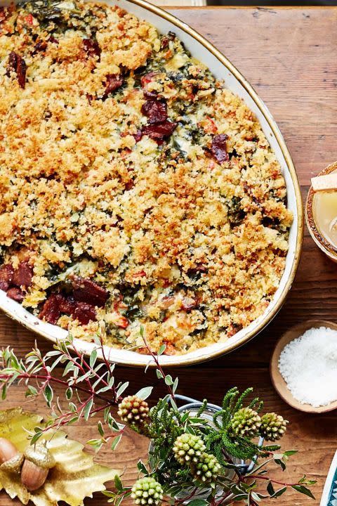 <p>Inspired by spinach dip, this baked kale gratin puts a mouthwatering twist on the traditional app we know and love. You can substitute collard, turnip or mustard greens for the kale, but be sure to remove any thick stems.</p><p><a href="https://www.womansday.com/food-recipes/food-drinks/recipes/a40042/baked-kale-gratin-recipe-clx1114/" rel="nofollow noopener" target="_blank" data-ylk="slk:Get the Baked Kale Gratin recipe.;elm:context_link;itc:0;sec:content-canvas" class="link "><em><strong>Get the Baked Kale Gratin recipe.</strong></em></a> </p>