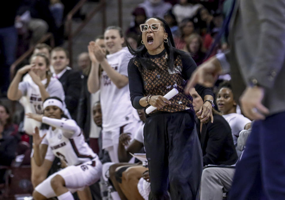 South Carolina coach Dawn Staley dispute a call during the second half of an NCAA college basketball game against Kentucky, Thursday, Jan. 2, 2020 in Columbia, S.C. (Tracy Glantz/The State via AP)