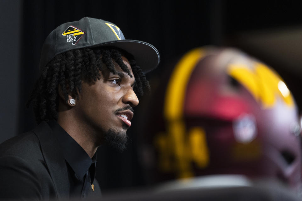 Washington Commanders' first round draft pick Jayden Daniels speaks to reporters during an NFL football news conference in Ashburn, Va., Friday, April 26, 2024. (AP Photo/Manuel Balce Ceneta)