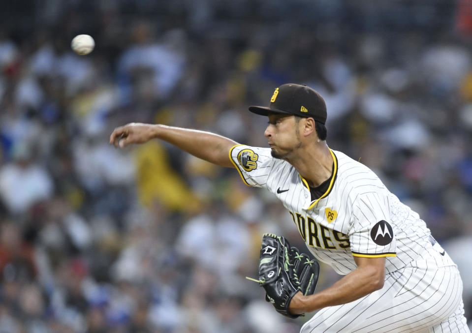 San Diego Padres starting pitcher Yu Darvish (11) delivers during the second inning of a baseball game against the Chicago Cubs, Monday, April 8, 2024, in San Diego. (AP Photo/Denis Poroy)