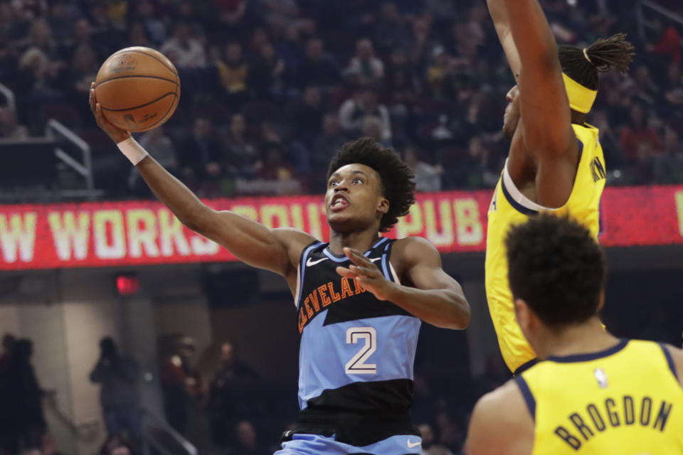 Cleveland Cavaliers' Collin Sexton (2) drives to the basket against the Indiana Pacers in the first half of an NBA basketball game, Saturday, Feb. 29, 2020, in Cleveland. (AP Photo/Tony Dejak)