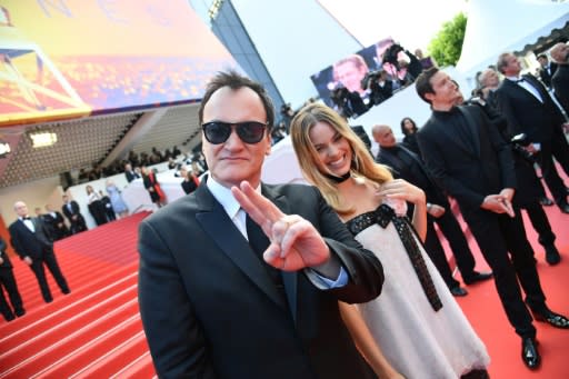 Australian actress Margot Robbie joined Tarantino on the red carpet