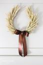 <p>It's simple, chic, and so seasonal. This is a perfect option for anyone hoping to make an elegant statement.</p><p><strong>Get the tutorial at <a href="https://sincerelymariedesigns.com/a-fall-wheat-horseshoe-wreath-tutorial/" rel="nofollow noopener" target="_blank" data-ylk="slk:Sincerely Marie Designs;elm:context_link;itc:0;sec:content-canvas" class="link ">Sincerely Marie Designs</a>.</strong></p><p><a class="link " href="https://www.amazon.com/GREENWISH-Natural-Arrangements-Wholesale-Centerpieces/dp/B0824QP4WC/ref=dp_prsubs_1?pd_rd_i=B0824QP4WC&psc=1&tag=syn-yahoo-20&ascsubtag=%5Bartid%7C10050.g.22628923%5Bsrc%7Cyahoo-us" rel="nofollow noopener" target="_blank" data-ylk="slk:SHOP WHEAT SHEAVES;elm:context_link;itc:0;sec:content-canvas">SHOP WHEAT SHEAVES</a></p>