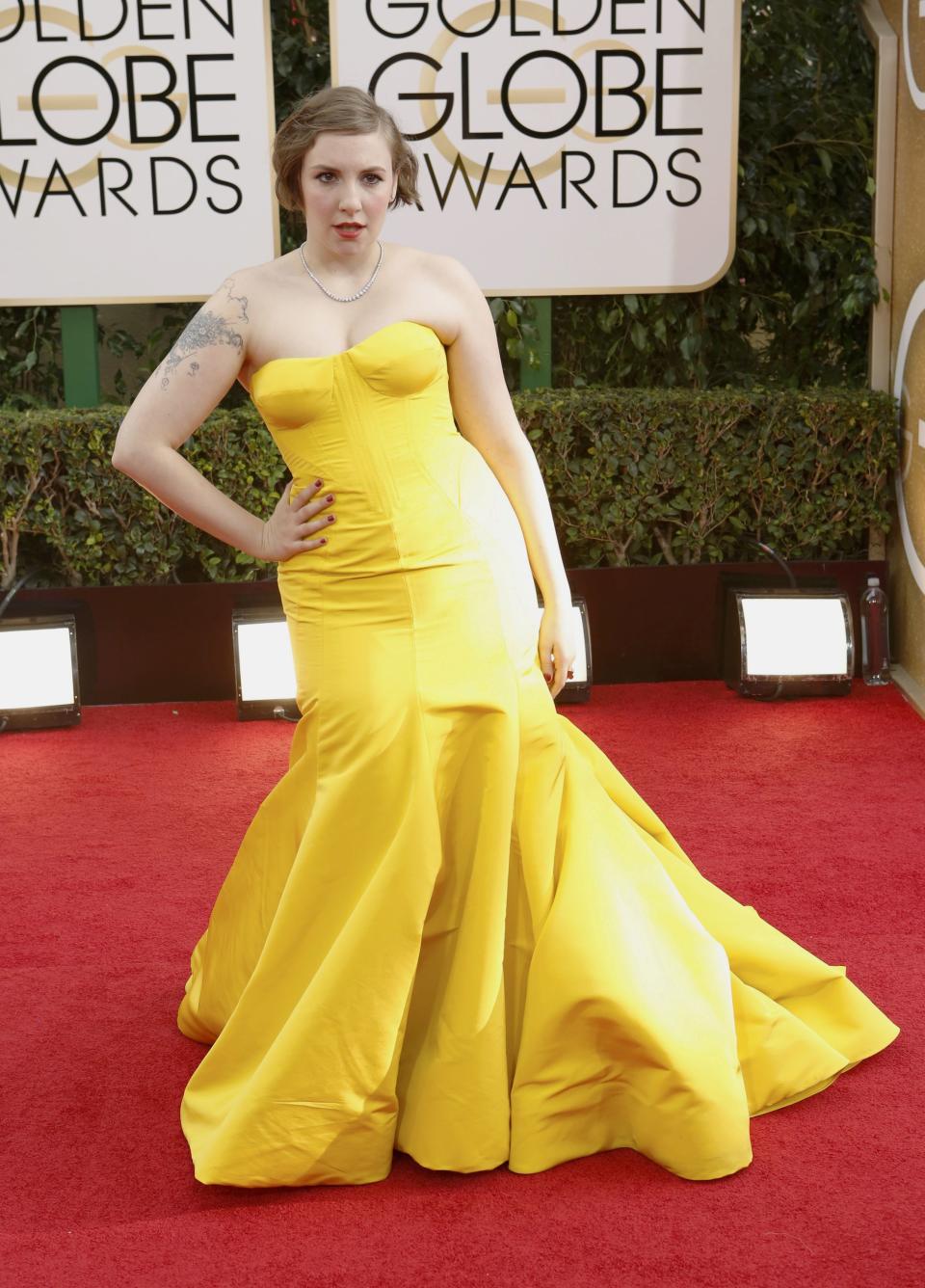 Actress Lena Dunham arrives at the 71st annual Golden Globe Awards in Beverly Hills