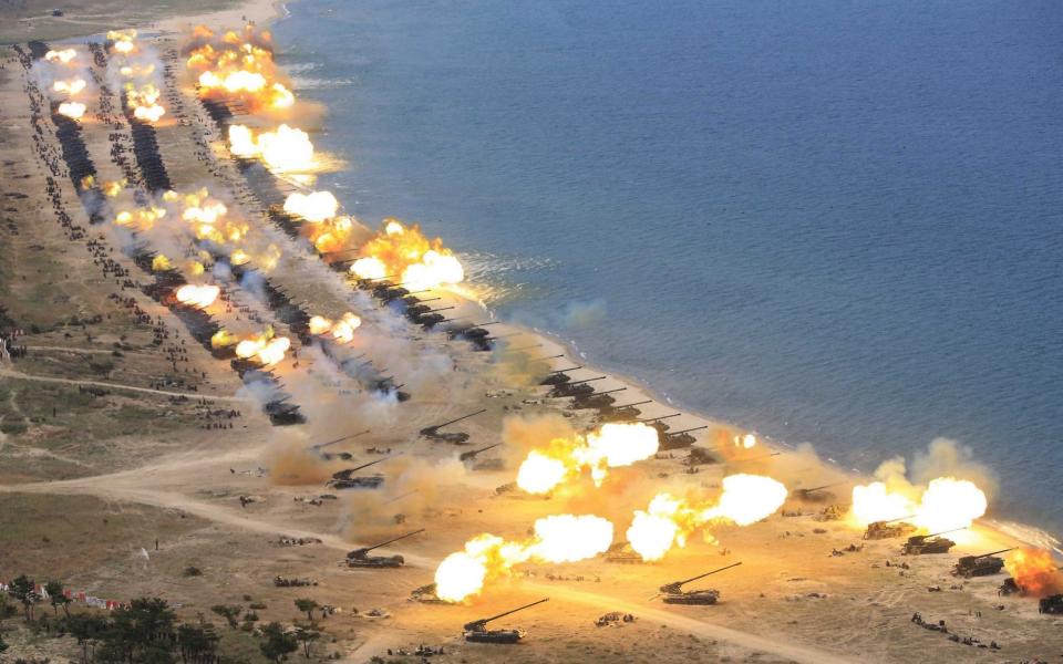 An undated photograph released by the Korean Central News Agency (KCNA) on 26 April 2017 shows the combined fire demonstration of the services of the Korean People's Army in celebration of its 85th founding anniversary, at an undisclosed location in North Korea - Credit: KCNA