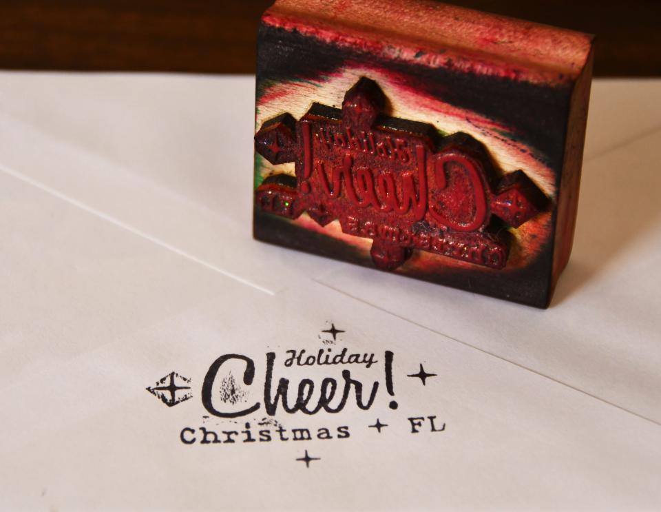 There are a selection of Christmas themed rubber stamps in the lobby of the Christmas, Florida, post office for people to adorn their Christmas card envelopes with holiday caches.