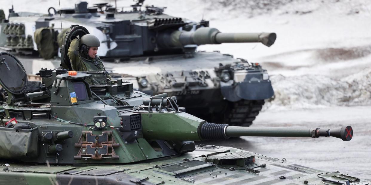 Swedish and Finnish tanks are seen during a military exercise called "Cold Response 2022", gathering around 30,000 troops from NATO member countries plus Finland and Sweden, amid Russia's invasion of Ukraine, in Evenes, Norway, March 22, 2022.