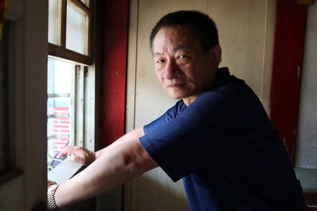 Lin Guo-cing, a senior official of the Chinese Unity Promotion Party, is seen at his home in Tainan