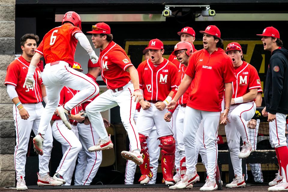 Maryland's Matt Shaw (6) celebrates with teammates after scoring a grand slam during an NCAA Big Ten Conference baseball game against Iowa, Friday, March 31, 2023, at Duane Banks Field in Iowa City, Iowa.