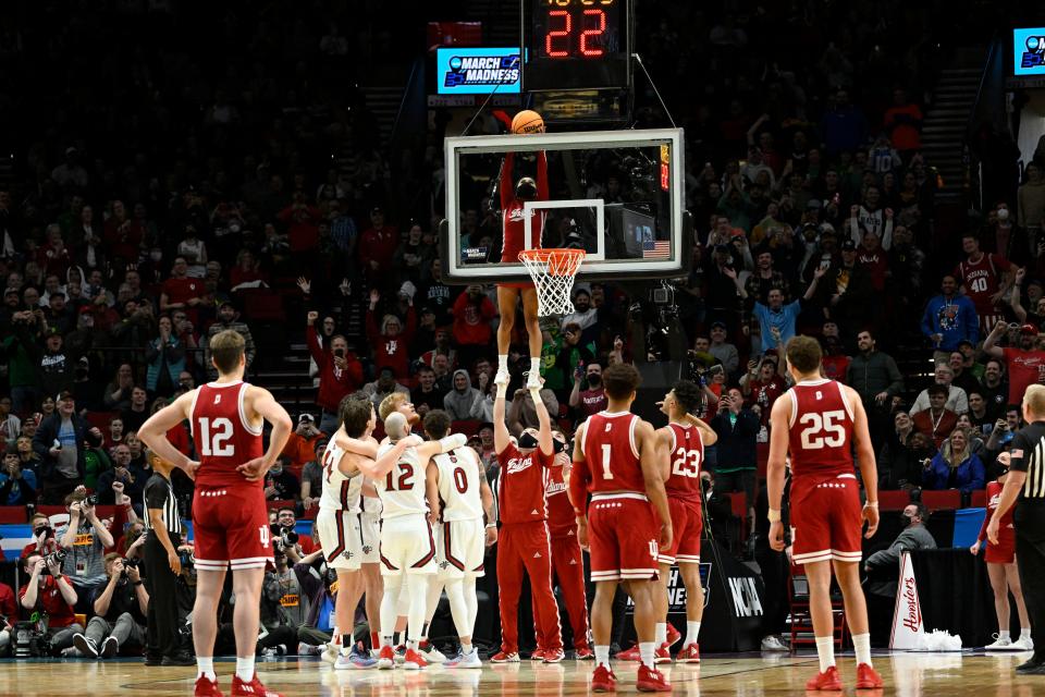 Mar 17, 2022; Portland, OR, USA; Indiana Hoosiers cheerleaders retrieve the basketball against the Saint Mary's Gaels during the second half during the first round of the 2022 NCAA Tournament at Moda Center.