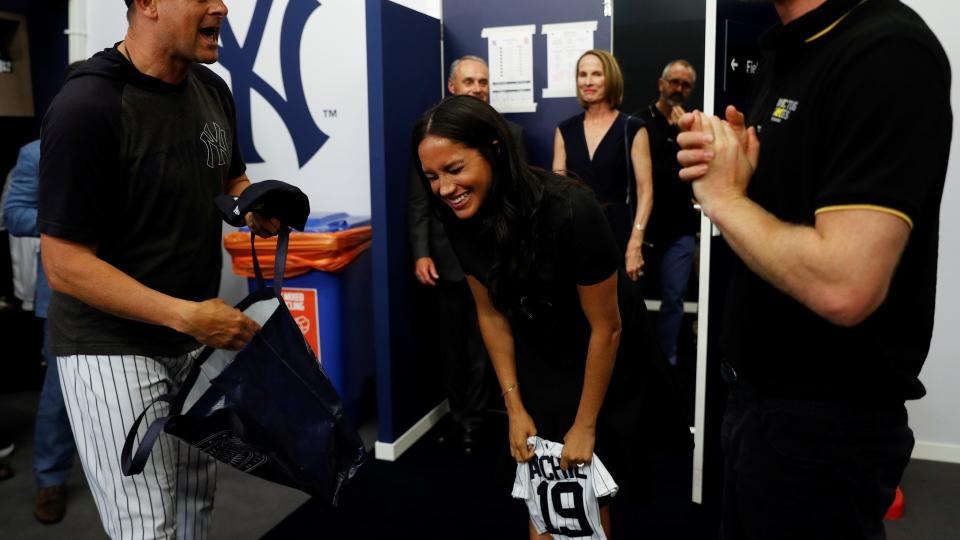 <p> In 2019, Meghan Markle looked delighted when she was gifted a rare, one-of-a-kind present for Prince Archie. </p> <p> Harry and Meghan attended a game for the New York Yankees, where they were presented with a sweet gift by the team's manager. </p> <p> The normally cool and collected Duchess looked star-struck in this hilariously sweet shot. The gift in question? A custom jersey with Archie's name on the back and the number 19 - the year he was born. </p>