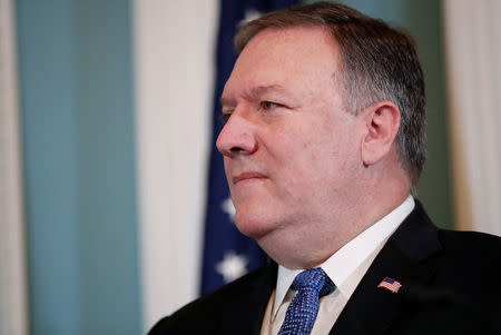 U.S. Secretary of State Mike Pompeo listens as Georgia's Prime Minister Giorgi Kvirikashvili delivers remarks at their Georgia Strategic Partnership meeting at the State Department in Washington, U.S., May 21, 2018. REUTERS/Leah Millis