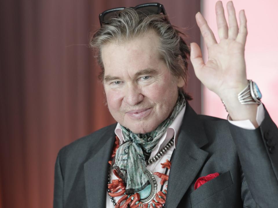 Val Kilmer waving in July 2019.