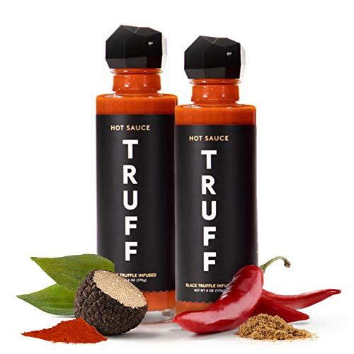 <p><strong>TRUFF</strong></p><p>amazon.com</p><p><strong>$34.99</strong></p><p><a href="https://www.amazon.com/dp/B083QT3MLV?tag=syn-yahoo-20&ascsubtag=%5Bartid%7C10063.g.34770445%5Bsrc%7Cyahoo-us" rel="nofollow noopener" target="_blank" data-ylk="slk:Shop Now;elm:context_link;itc:0;sec:content-canvas" class="link ">Shop Now</a></p><p>For the couple that craves dishes with a kick, black truffle hot sauces will add a punch of spiciness and umami.</p>