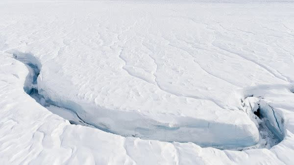  A crack in an ice sheet an Antarctica ice sheet caused by climate change. 