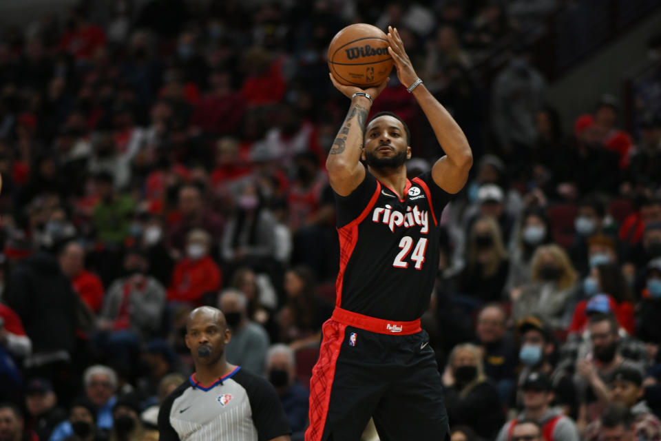 CHICAGO, ILLINOIS - JANUARY 30: Norman Powell #24 of the Portland Trail Blazers, now with the Los Angeles Clippers,  shoots a three point basket in the first half against the Chicago Bulls at United Center on January 30, 2022 in Chicago, Illinois.  NOTE TO USER: User expressly acknowledges and agrees that, by downloading and or using this photograph, User is consenting to the terms and conditions of the Getty Images License Agreement.  (Photo by Quinn Harris/Getty Images)