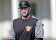 FILE - In this Feb. 15, 2019, file photo, Baltimore Orioles manager Brandon Hyde walks on the field at their spring training baseball facility in Sarasota, Fla. The rookie manager is putting his stamp on the Orioles this spring training, one fundamental at a time. (AP Photo/Gerald Herbert, File)