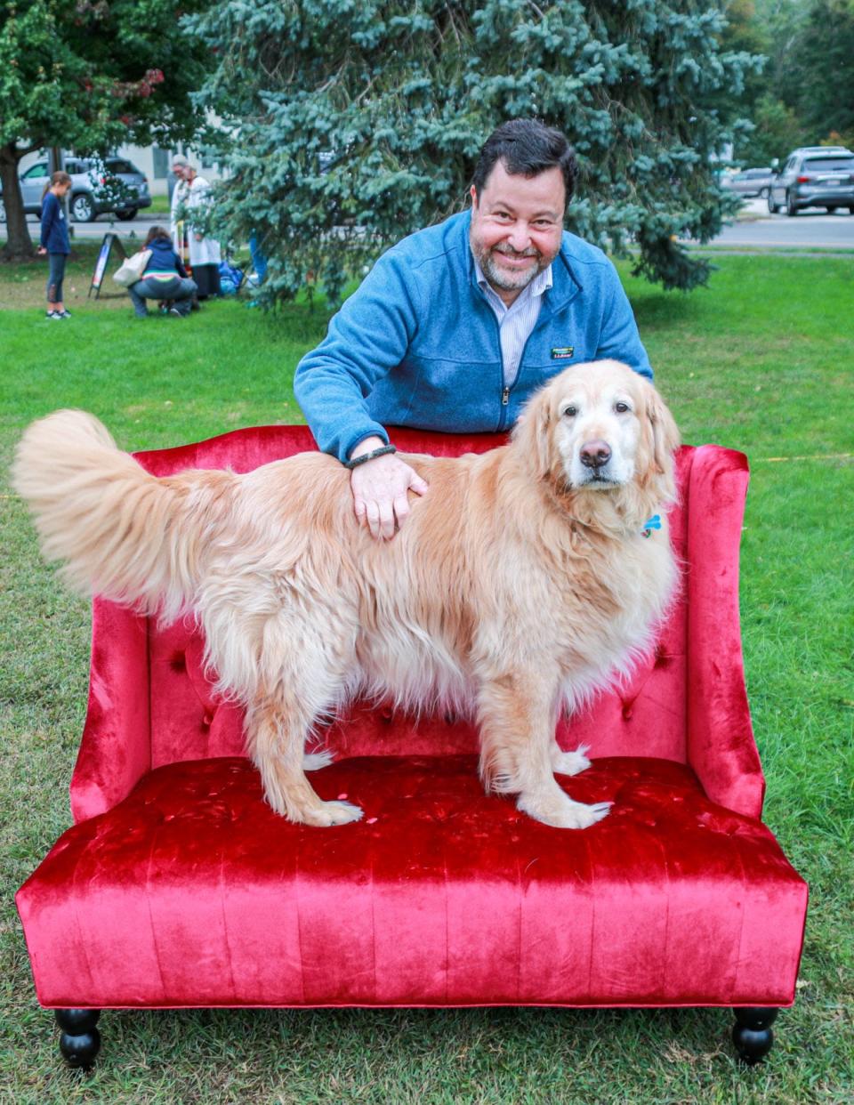 Cohasset Town Manager Chris Senior with his former dog Casey, who greeted visitors to Cohasset Town Hall for several years.