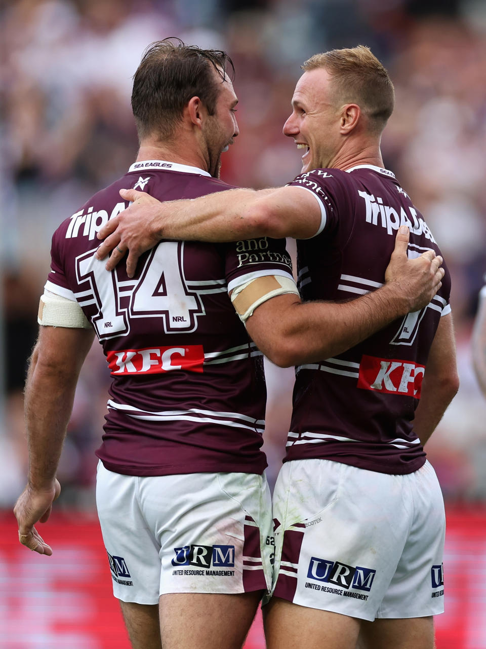 Karl Lawton and Daly Cherry-Evans celebrate.