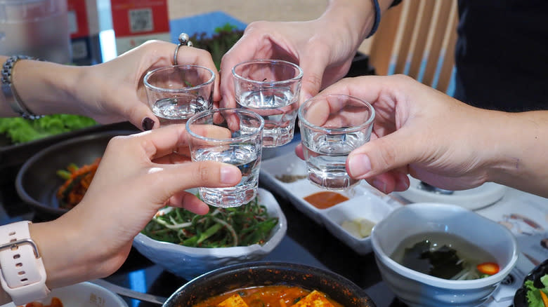 soju cheers over food