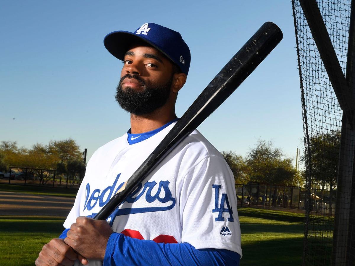 Los Angeles Dodgers' Andrew Toles runs to first during the second