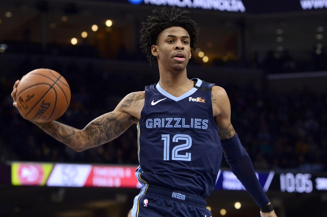 Memphis Grizzlies guard Ja Morant (12) plays in the second half of an NBA basketball game against the Atlanta Hawks Saturday, March 7, 2020, in Memphis, Tenn. (AP Photo/Brandon Dill)