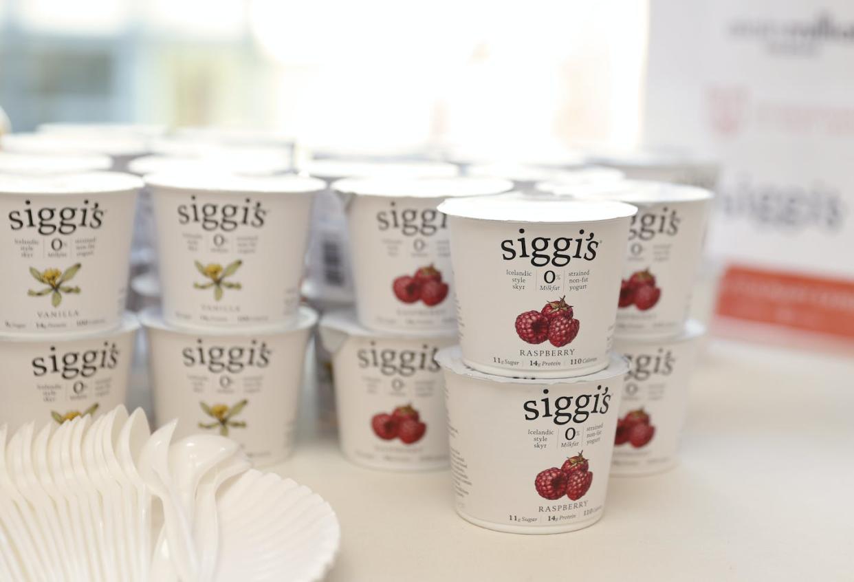 Siggi's Dairy keeps its yogurts simple with white packaging, black text and a dab of color to indicate the flavor. <a href="https://www.gettyimages.com/detail/news-photo/siggis-yogurt-is-seen-on-during-day-1-of-the-new-york-news-photo/482897027?adppopup=true" rel="nofollow noopener" target="_blank" data-ylk="slk:Neilson Barnard/Getty Images;elm:context_link;itc:0;sec:content-canvas" class="link ">Neilson Barnard/Getty Images</a>