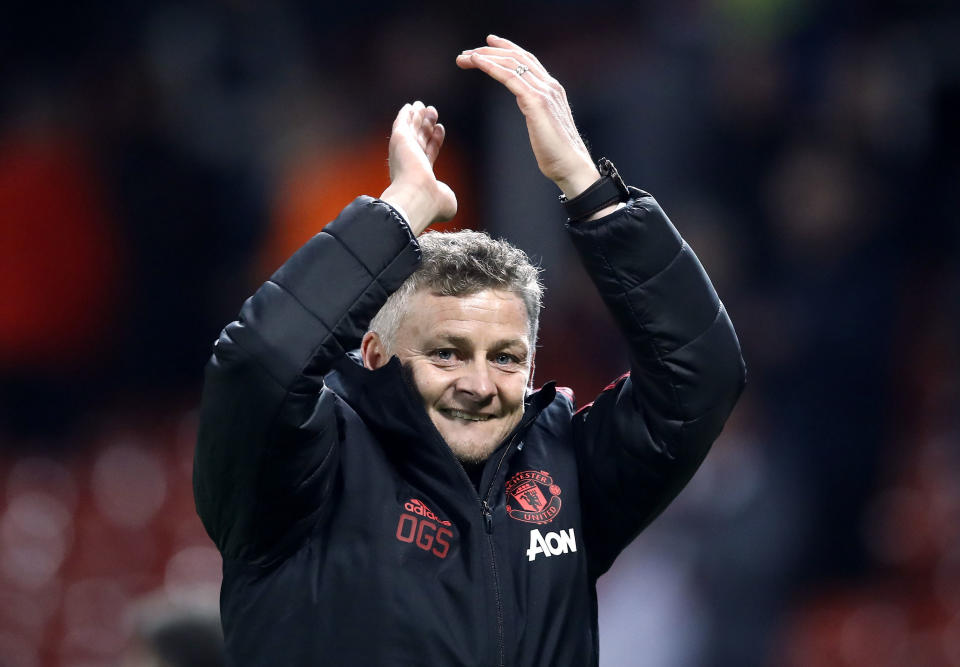 Manchester United interim manager Ole Gunnar Solskjaer celebrates defeating Huddersfield after the English Premier League soccer match at Old Trafford, Manchester, England, Wednesday Dec. 26, 2018. (Martin Rickett/PA via AP)