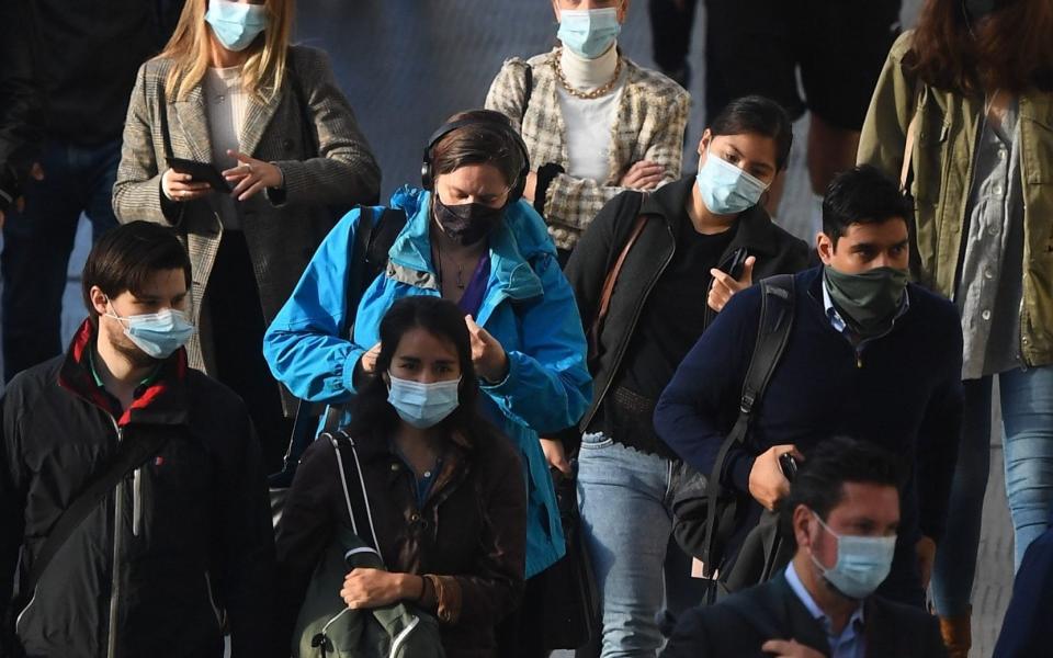 Commuters at Waterloo Station, in London - Victoria Jones / PA 