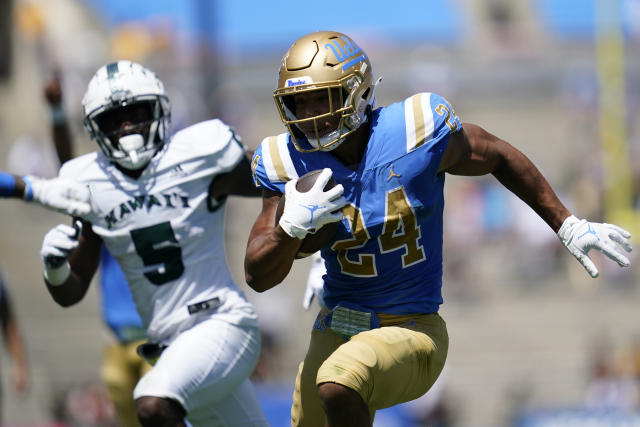 UCLA Bruins running back Zach Charbonnet (24) runs to the end zone for a touchdown during the first half of an NCAA college football game against the Hawaii Warriors Saturday, Aug. 28, 2021, in Pasadena, Calif. (AP Photo/Ashley Landis)