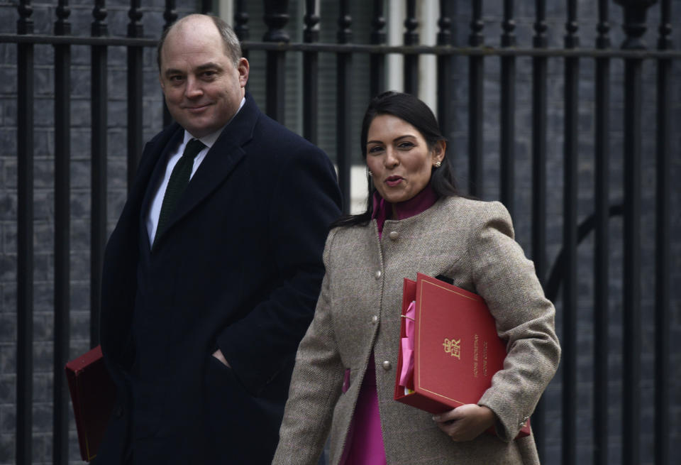 LONDON, UNITED KINGDOM - FEBRUARY 14: Britain's Defence Secretary Ben Wallace (L) and Britain's Home Secretary Priti Patel (R) arrive for the first meeting of the cabinet following yesterday's reshuffle at 10 Downing Street on February 14, 2020 in London, England. The Prime Minister reshuffled the Cabinet yesterday. High profile changes were Attorney General Geoffrey Cox, Business Secretary Andrea Leadsom, Housing Minister Esther McVey and Northern Ireland Minister Julian Smith all sacked and Chancellor Sajid Javid resigned. (Photo by Peter Summers/Getty Images)