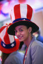 A hostess wears an American flag hat while attending a U.S. election party at the Bertelsmann Foundation on November 6, 2012 in Berlin, Germany. (Photo by Sean Gallup/Getty Images)