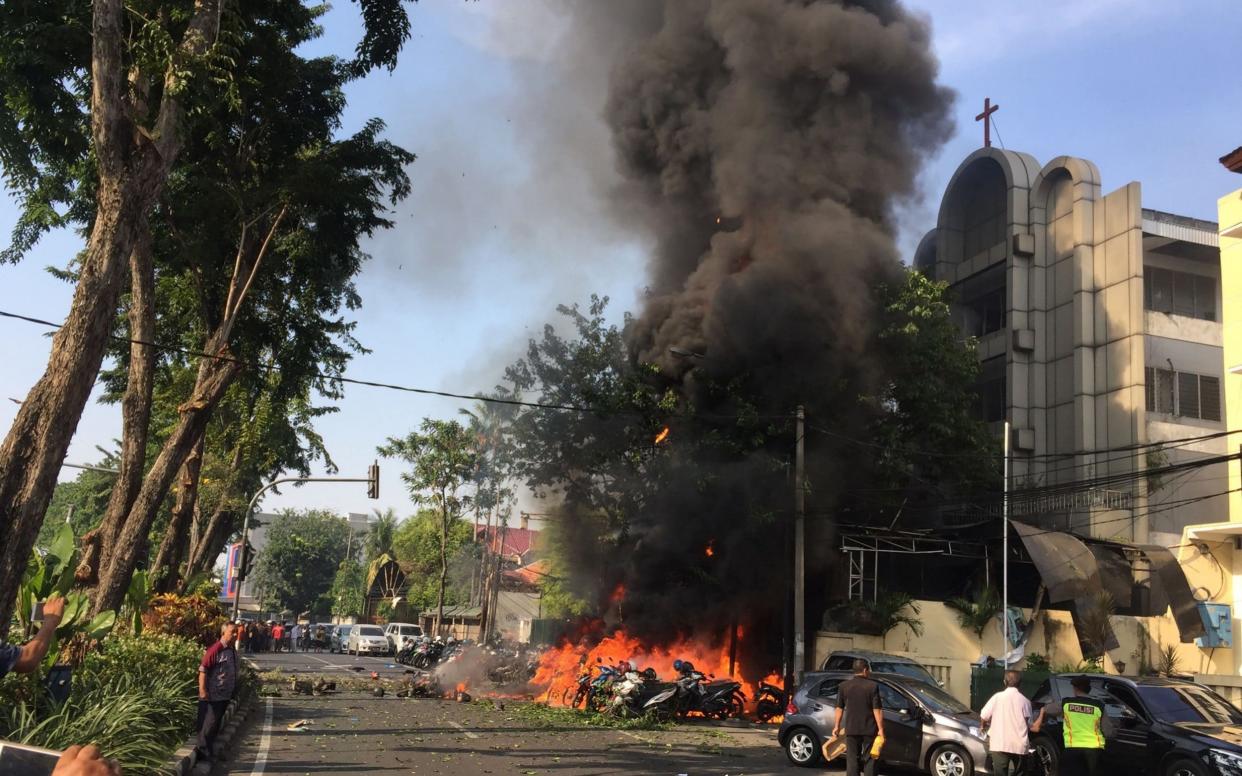 The bombing of three churches in Surabaya in May shocked Indonesia - AFP