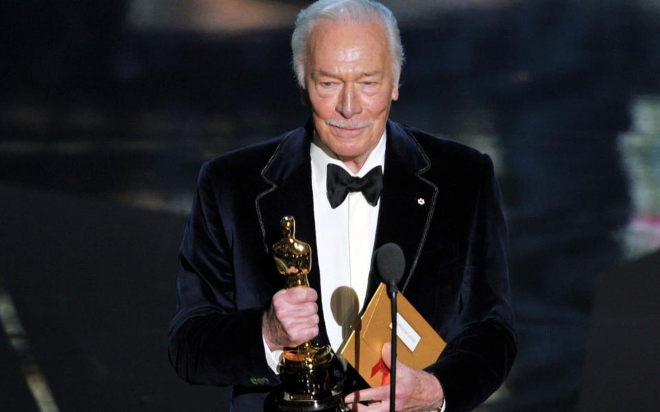 Picking up his Oscar for Beginners in 2012 - Kevin Winter/Getty Images