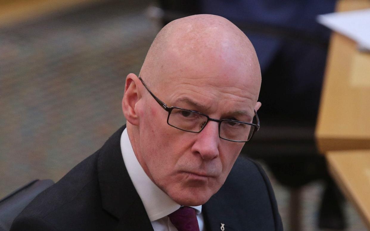 Scotland's Deputy First Minister John Swinney during a Covid briefing at the Scottish Parliament in Holyrood, Edinburgh. Issue date: Thursday May 27, 2021. PA Photo. See PA story SCOTLAND Coronavirus. Photo credit should read: Fraser Bremner/Daily Mail/PA Wire NOTE TO EDITORS: This handout photo may only be used in for editorial reporting purposes for the contemporaneous illustration of events, things or the people in the image or facts mentioned in the caption. Reuse of the picture may require further permission from the copyright holder. - Fraser Bremner/PA Wire