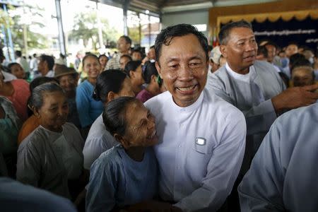 Shwe Mann, speaker of Union Parliament and Lower House of Parliament, greets locals in his constituency, which he will be contesting in the upcoming general election, at Kanyutkwin, Pyu township, Bago division, Myanmar in this August 22, 2015 file photo. REUTERS/Soe Zeya Tun/Files