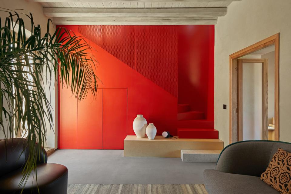 The living room and stairs inside the 1 Euro House in Sambuca, Sicily