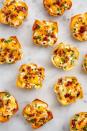 <p>These little cups might look all cute and innocent, but just wait until you taste the jalapeño.</p><p>Get the <strong><a href="https://www.delish.com/cooking/recipe-ideas/recipes/a51878/jalapeno-popper-cups-recipe/" rel="nofollow noopener" target="_blank" data-ylk="slk:Jalapeño Popper Wonton Cups recipe;elm:context_link;itc:0;sec:content-canvas" class="link ">Jalapeño Popper Wonton Cups recipe</a></strong> from Delish.</p>