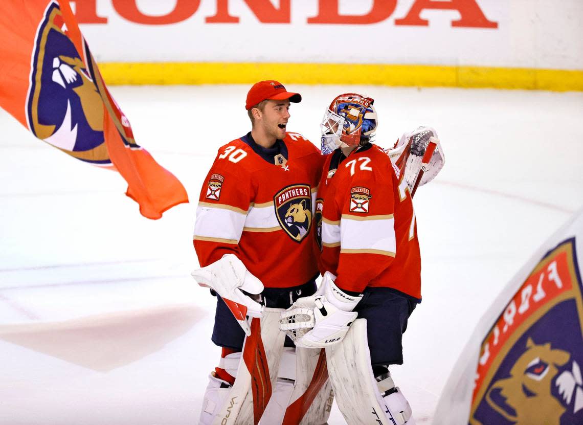 Florida Panthers goaltenders Sergei Bobrovsky (72) and Spencer Knight (30) celebrate their 6-1 win over the New York Islanders during an NHL game at the FLA Live Arena on Tuesday, November 16, 2021 in Sunrise, Fl.