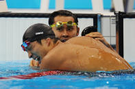 LONDON, ENGLAND - AUGUST 01: (L-R) Kosuke Kitajima of Japan and Ryo Tateishi of Japan celebrate after Tateishi finished third in the Final for the Men's 200m Breaststroke on Day 5 of the London 2012 Olympic Games at the Aquatics Centre on August 1, 2012 in London, England. (Photo by Mike Hewitt/Getty Images)